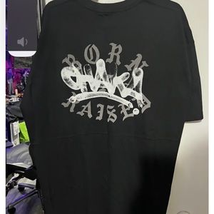 Selling a white born x raised shirt